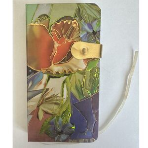 Notebook with magnetic clasp